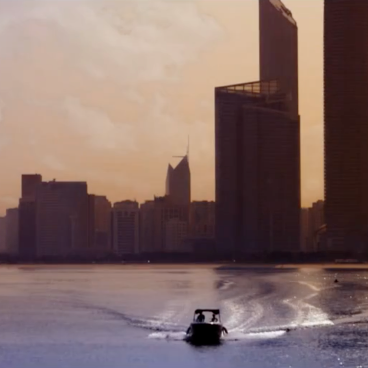 Life in Abu Dhabi: jet skiing with Abu Dhabi city in the background